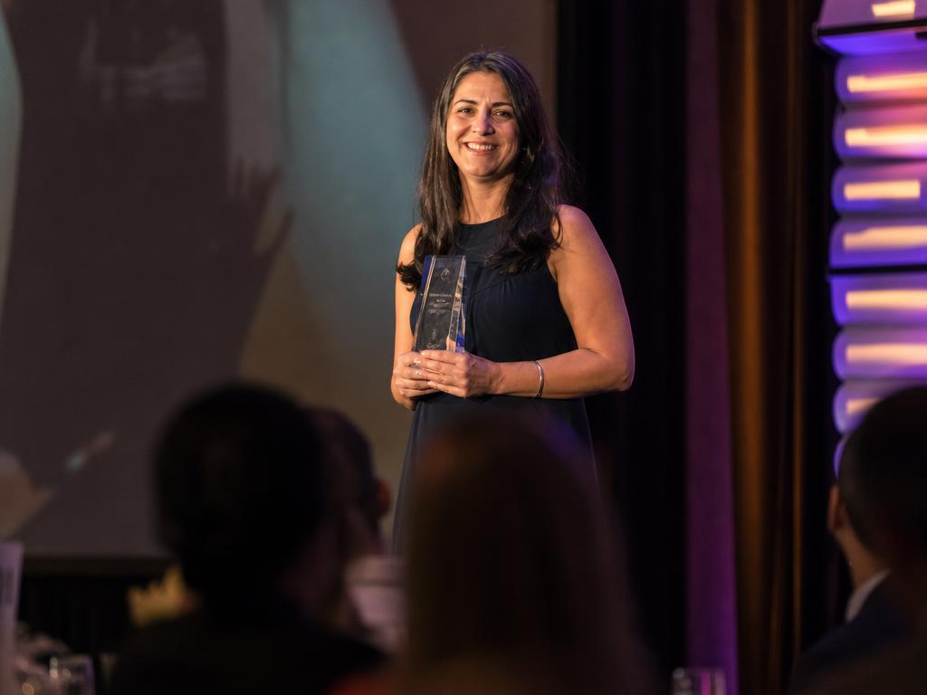 Award winner on stage at the Global Excellence Awards, Bristol corporate event photography
