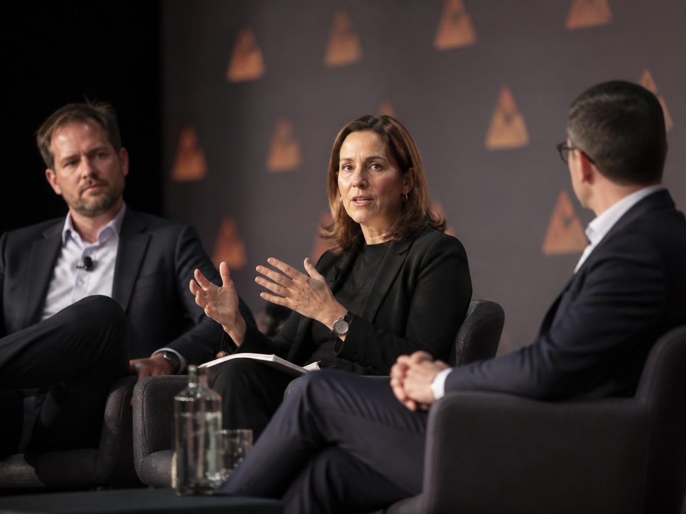 Panel discussion photographed on stage at a Bristol corporate conference